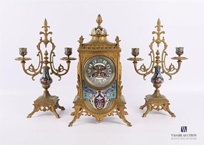 null A bronze mantel with polychrome enamelled decoration of floral and foliage scrolls...