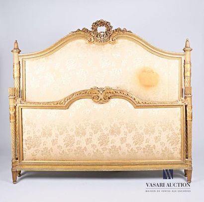 null Carved and gilded molded wood bed with two divergent headboards presenting for...