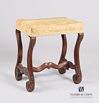 null Moulded mahogany stool, the seat is rectangular in shape, it rests on four scrolled...