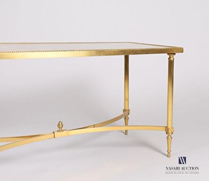 null Coffee table, the top of rectangular shape dead gilded topped with a glass,...