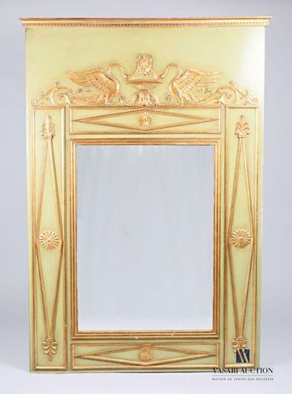 null Moulded, sculpted, green lacquered and gold rechampi wood paneled mirror, it...