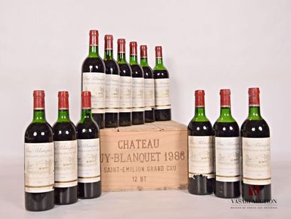 null 12 bouteilles	Château PUY BLANQUET	St Emilion GC	1986
	Et.: 8 un peu tachées...