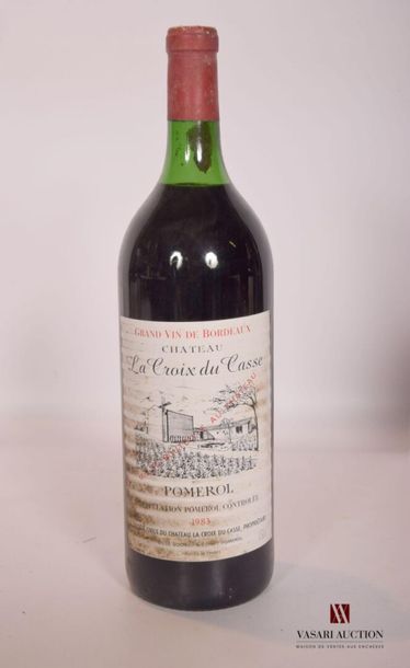 null 1 magnum	Château LA CROIX DU CASSE	Pomerol	1983
	Et. tachée. N : bas goulot...