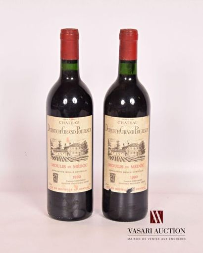 null 2 bouteilles	Château DUTRUCH GRAND POUJEAUX	Moulis en Médoc	1990
	Et.: 1 tachée,...