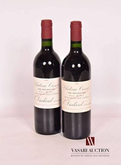 null 2 bouteilles	Château CISSAC	Haut Médoc CB	1990
	Et. légèrement tachées. N :...
