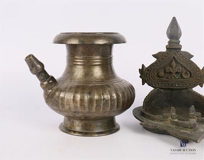null INDIA
A bronze pot or "Lota" in the form of a baluster with a silver patina,...