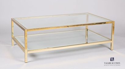 null Table basse de forme rectanagulaire en métal doré, le plateau en verre ourlé...