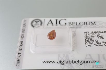 null Pear orange diamond of 1.05 carat with AIG certificate mentioning clarity I2,...