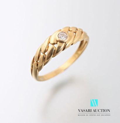 null Ring in braided 750 thousandths yellow gold with a brilliant of about 0.05 carat.
Gross...