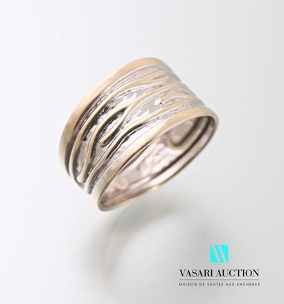 750 thousandths gold ring with wave-stamped...