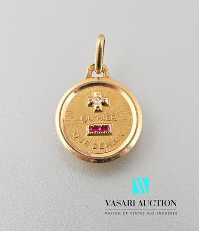 null Small love medal in yellow gold 750 thousandths set with a diamond and two synthetic
rubies...