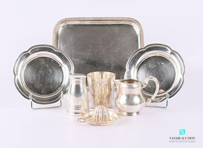 null A silver metal lot comprising a pair of coasters, a poly-lobed border, a baluster-shaped...