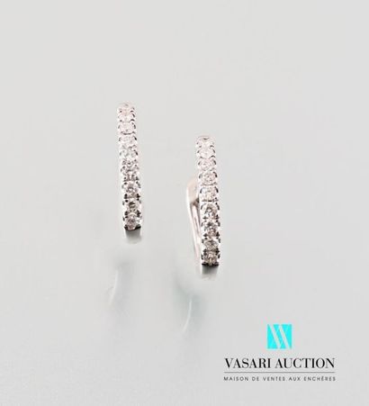 null Pair of Creole earrings in white gold 750 thousandths set with modern
cut diamonds...
