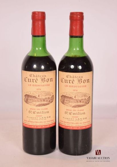 null 2 bouteilles	Château CURÉ BON LA MADELEINE	St Emilion GCC	1974
		Et. un peu...