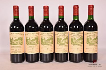 null 6 bouteilles	Château CARBONNIEUX	Graves GCC	1990
		Et. impeccables. N : 4 mi...