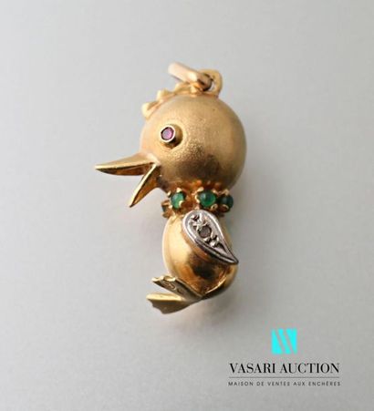 null Pendant in 750 thousandths yellow gold in the shape of a chick, the eyes adorned...