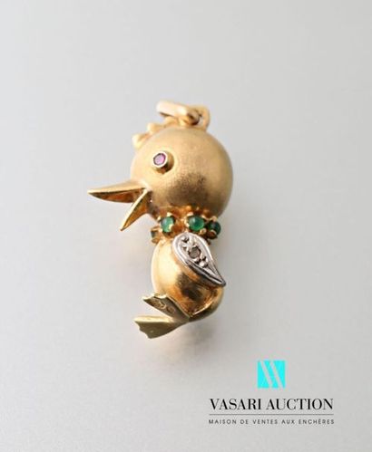 null Pendant in 750 thousandths yellow gold in the shape of a chick, the eyes adorned...