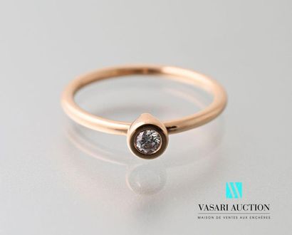 null 750 thousandths rose gold ring set with a brilliant of about 0.05 carat Gross...