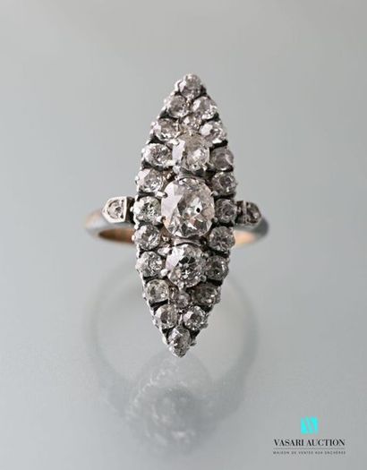 null Marquise ring in 750 thousandths gold paved with antique cut diamonds, the central...