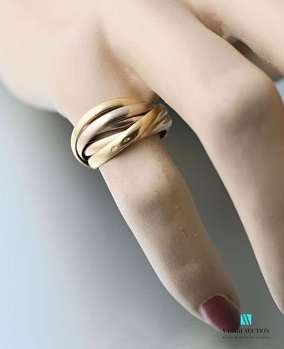 null Cartier, five interlaced three-tone gold rings, Must
collection Weight: 8.2...