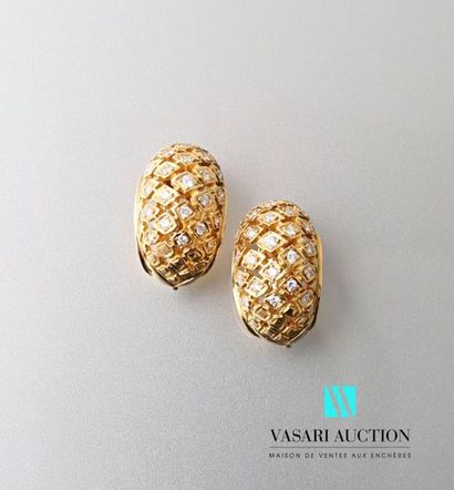 null Lalaounis, pair of 750 thousandths yellow gold ear clips with diamond
paved...