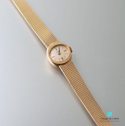 null Ladies' wristwatch in 750 thousandths yellow gold, the champagne dial marked...