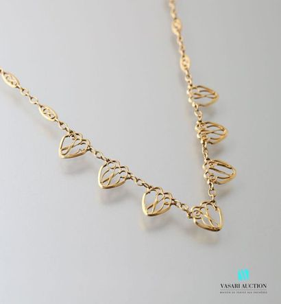 null Drapery necklace in yellow gold 750 thousandths, alternating oval and filigree...