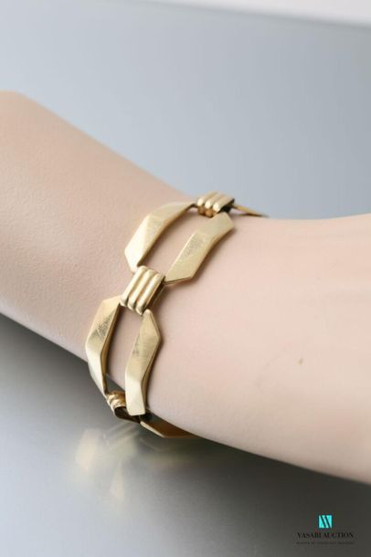 null Flexible bracelet in 750-thousandths yellow gold with alternating long links...