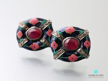 null Pair of enamelled silver earrings with flower motifs, each centered on a ruby...