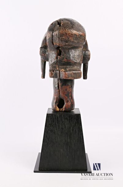 null FANG - GABON
Tête d'ancêtre de style Betsi en bois sculpté patiné 
Haut. : 26...