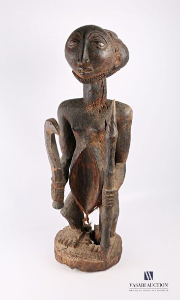 null ZAIRE - HEMBA
Statue Hemba de style "Niembo" en bois d'Iroko figurant un personnage...