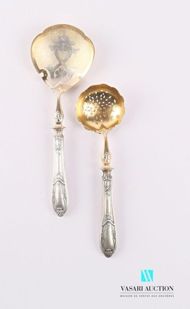null A strawberry serving set comprising a serving spoon and a sprinkling spoon,...
