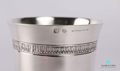 null A silver truncated-cone shaped timbale set on a flat base with a border hemmed...