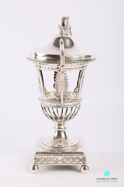 null Silver jam maker (1819-1838) resting on a square base hemmed with laurel branches...