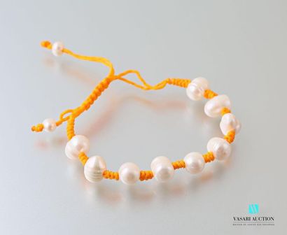 null Bracelet sur coton orange orné de perles blanches