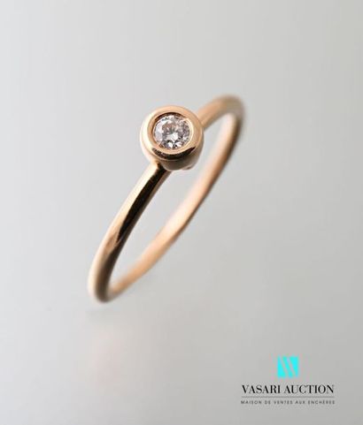 null 750 thousandths rose gold ring set with a brilliant of about 0.05 carat Gross...