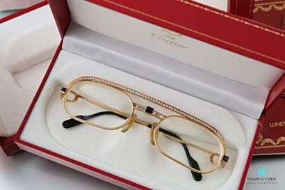 null Cartier, a pair of 750 thousandths yellow gold spectacles from the Must collection,...