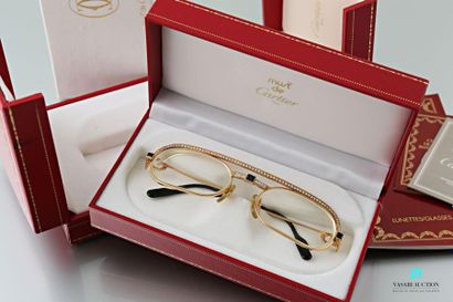  Cartier, a pair of 750 thousandths yellow gold spectacles from the Must collection,...