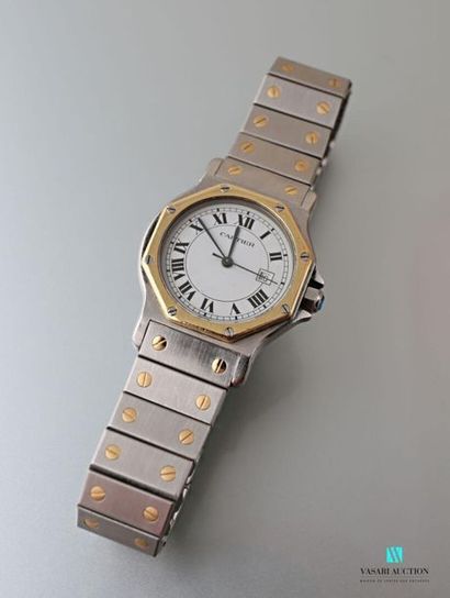 null CARTIER
Santos, ladies' wristwatch in steel and gold. Octagonal-shaped case...