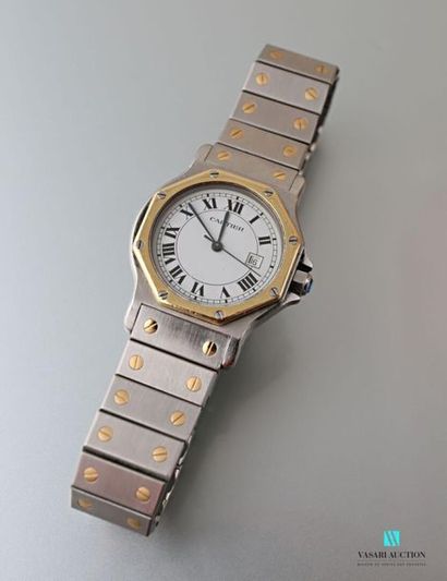 null CARTIER
Santos, ladies' wristwatch in steel and gold. Octagonal-shaped case...