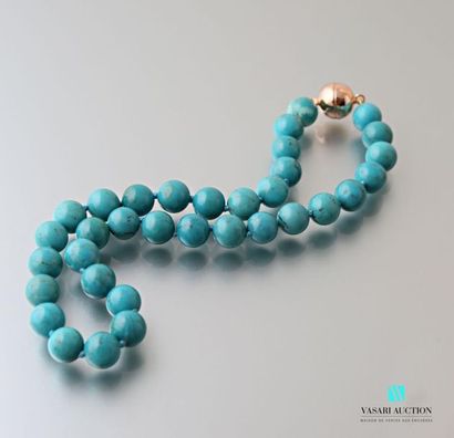 null Necklace in 10 mm Arizona turquoise beads, the clasp in magnetic vermeil.
(a...