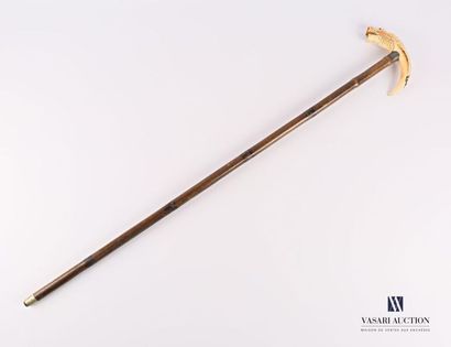 null Cane with warthog tooth pommel carved with a tiger's head, bamboo
shaft (one...