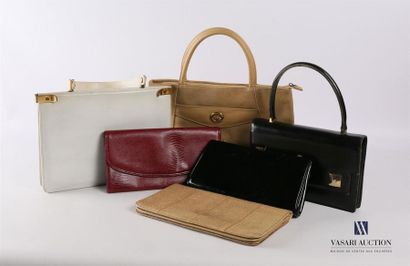 null Set of four handbags made of different materials without visible
marks (wear...