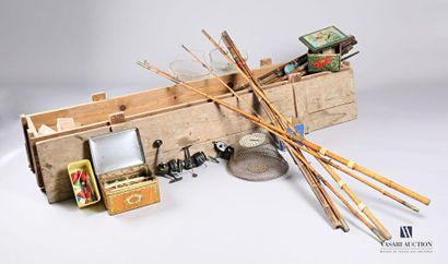 null Wooden box containing fishing equipment including bamboo rods, hooks, floats,...