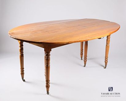 Dining room table in natural wood, the oval...
