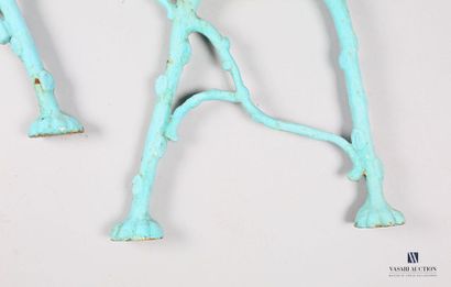 null Pair of cast iron bench legs painted turquoise blue simulating branches.
Beginning...