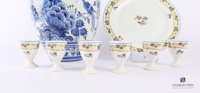 null A suite of six egg cups and a white Limoges porcelain plate with a printed frieze...