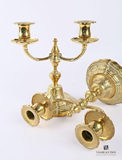 null Pair of bronze candelabra resting on a round base with an animated doucine with...