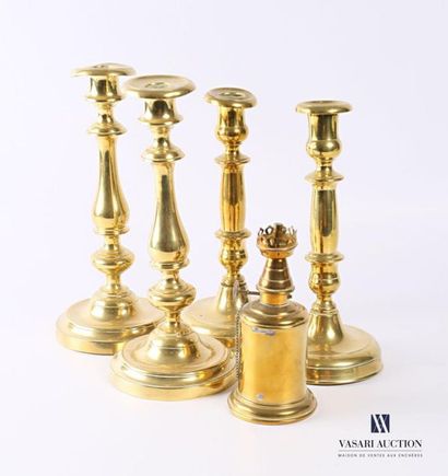 null Two pairs of brass torches resting on a round to soft base decorated with fillets,...