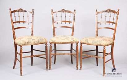 Suite of three chairs, the openwork backrest...